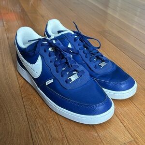 Size 10 Nike Blue shoes.